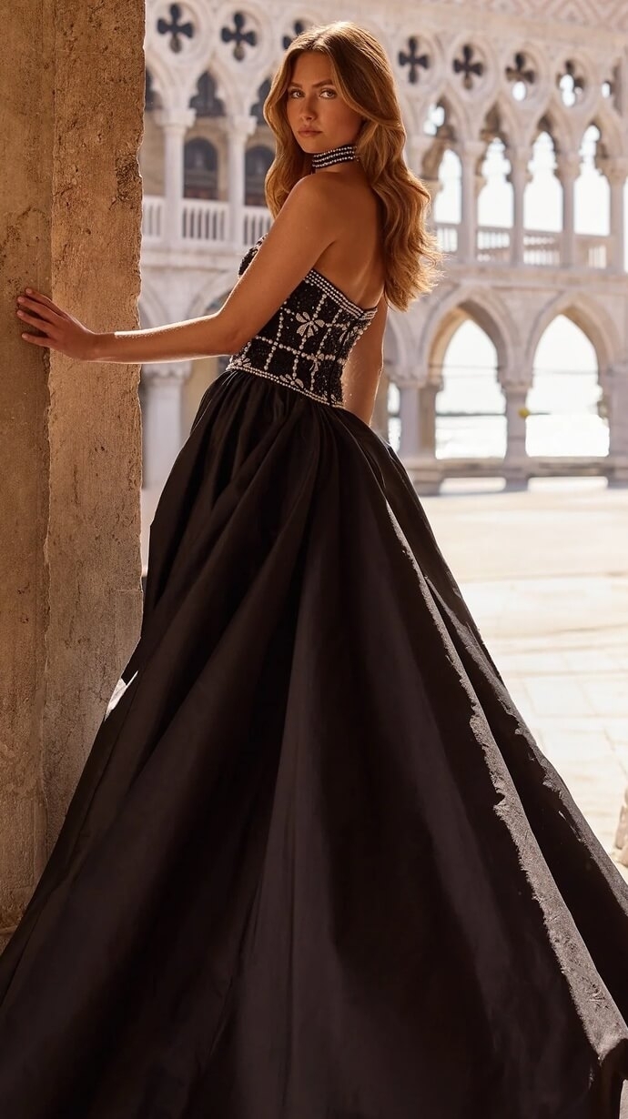 Model wearing a black dress